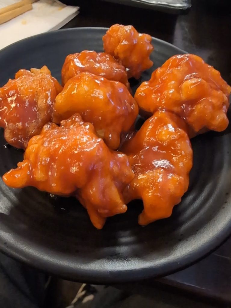 Orange and sticky General Tso's Chicken.